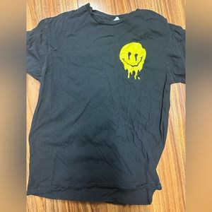 medium black shirt with melting smiley face